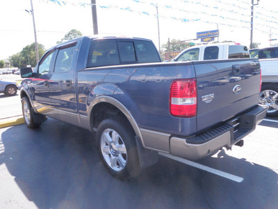 ford f 150 2006 dk  blue lariat gasoline 8 cylinders 4 wheel drive automatic with overdrive 32401