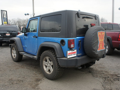 jeep wrangler 2010 lt  blue suv sport gasoline 6 cylinders 4 wheel drive 6 speed manual 08812