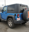 jeep wrangler 2010 lt  blue suv sport gasoline 6 cylinders 4 wheel drive 6 speed manual 08812
