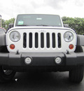 jeep wrangler unlimited 2012 white suv sport gasoline 6 cylinders 4 wheel drive manual 33157