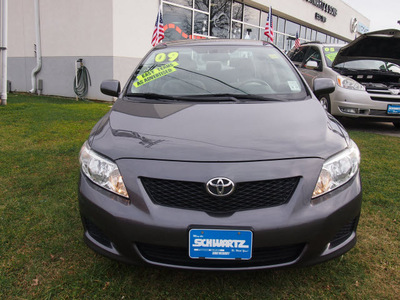 toyota corolla 2009 magnetic gray sedan le gasoline 4 cylinders front wheel drive automatic 07702