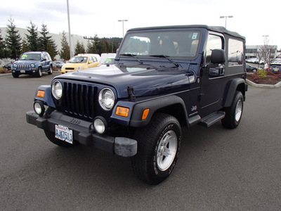 jeep wrangler 2004 blue suv unlimited gasoline 6 cylinders 4 wheel drive automatic 98371
