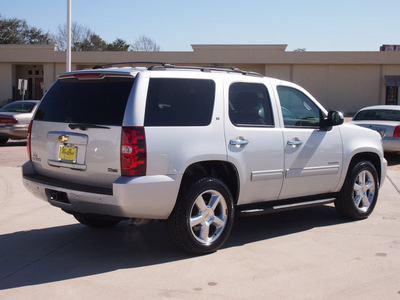 chevrolet tahoe 2010 silver suv lt flex fuel 8 cylinders 2 wheel drive automatic 77043