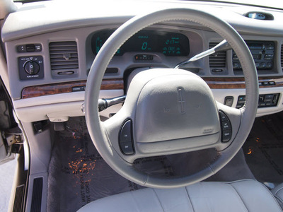 lincoln town car 1997 silver sedan executive gasoline v8 rear wheel drive automatic 77043