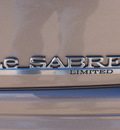 buick lesabre 2000 gold sedan limited gasoline v6 front wheel drive automatic 77043