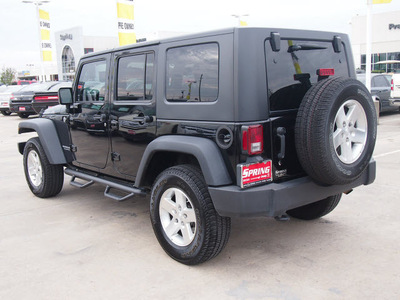 jeep wrangler unlimited 2010 black suv rubicon gasoline 6 cylinders 4 wheel drive automatic 77388