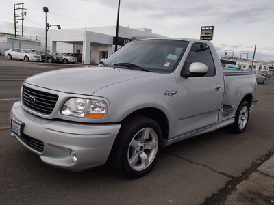 ford f 150 svt lightning 2002 silver gasoline 8 cylinders rear wheel drive 4 speed automatic 98901
