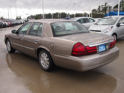 mercury grand marquis 2004 beige sedan ls premium gasoline 8 cylinders rear wheel drive automatic 77304