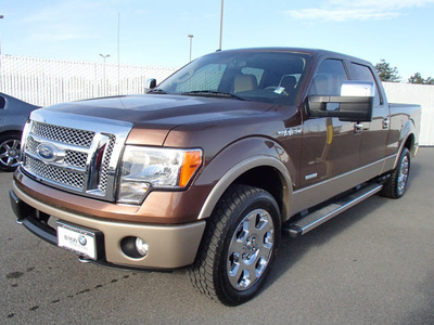 ford f 150 2012 brown lariat gasoline 6 cylinders 4 wheel drive automatic with overdrive 99352