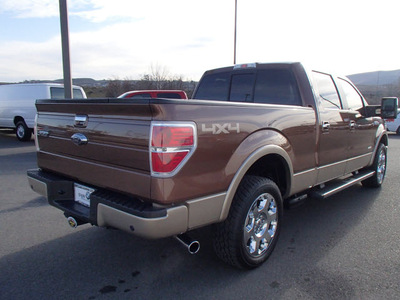 ford f 150 2012 brown lariat gasoline 6 cylinders 4 wheel drive automatic with overdrive 99352