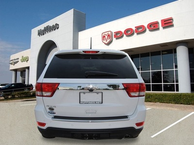 jeep grand cherokee 2013 white suv overland summit gasoline 6 cylinders 4 wheel drive automatic 75067