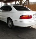 toyota avalon 1999 white sedan xl gasoline 6 cylinders front wheel drive automatic 77008