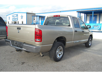 dodge ram 1500 2005 tan pickup truck slt gasoline 8 cylinders rear wheel drive automatic with overdrive 77627
