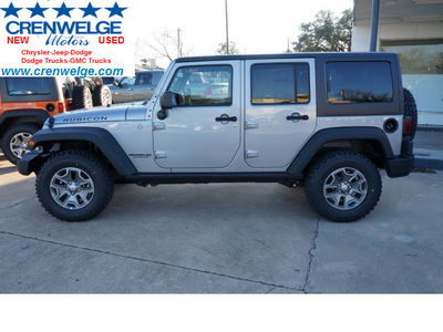 jeep wrangler unlimited 2013 silver suv rubicon gasoline 6 cylinders 4 wheel drive automatic 78624