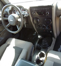 jeep wrangler 2010 black suv sport gasoline 6 cylinders 4 wheel drive manual 34474