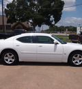 dodge charger 2010 white sedan sxt gasoline 6 cylinders rear wheel drive automatic 77515