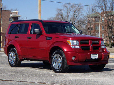 dodge nitro 2011 dk  red suv sxt gasoline 6 cylinders 4 wheel drive automatic 61832