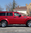 dodge nitro 2011 dk  red suv sxt gasoline 6 cylinders 4 wheel drive automatic 61832