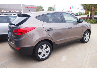 hyundai tucson 2013 brown gl gasoline 4 cylinders front wheel drive automatic 77074