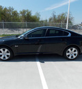 jaguar xf 2010 black sedan gasoline 8 cylinders rear wheel drive shiftable automatic 77074