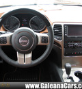 jeep grand cherokee 2013 black suv overland summit gasoline 6 cylinders 2 wheel drive automatic 33912