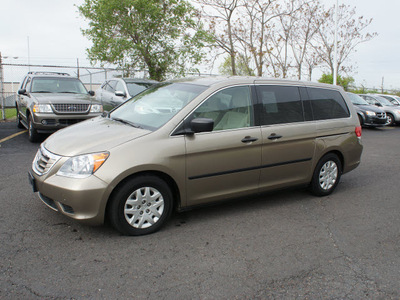 honda odyssey 2010 gold van lx gasoline 6 cylinders front wheel drive automatic 19153