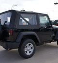 jeep wrangler 2012 black suv sport gasoline 6 cylinders 4 wheel drive 6 speed manual 76011
