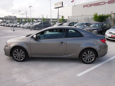 kia forte koup 2012 lt  gray coupe sx gasoline 4 cylinders front wheel drive automatic 77074