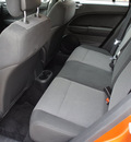dodge caliber 2011 orange wagon mainstreet gasoline 4 cylinders front wheel drive automatic 75110