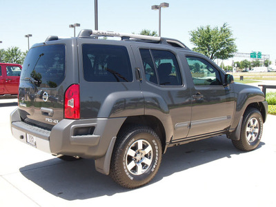 nissan xterra 2013 dk  gray suv pro 4x gasoline 6 cylinders 4 wheel drive automatic with overdrive 76011