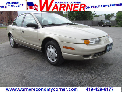 saturn s series 2002 gold sedan sl1 gasoline 4 cylinders front wheel drive automatic 45840