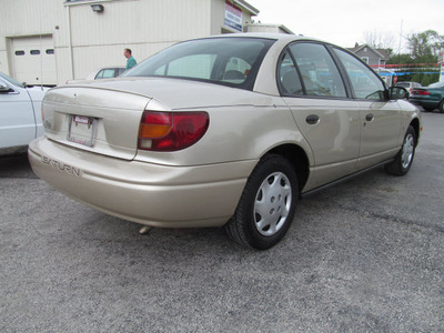 saturn s series 2002 gold sedan sl1 gasoline 4 cylinders front wheel drive automatic 45840