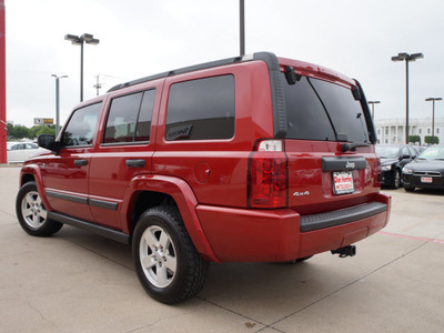 jeep commander 2006 red suv flex fuel 8 cylinders 4 wheel drive automatic 75062