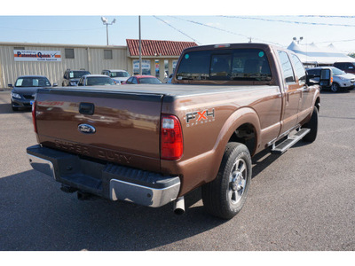 ford f 250 super duty 2011 brown lariat flex fuel 8 cylinders 4 wheel drive automatic 78539