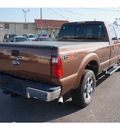 ford f 250 super duty 2011 brown lariat flex fuel 8 cylinders 4 wheel drive automatic 78539