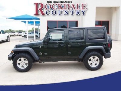 jeep wrangler unlimited 2011 green suv sport gasoline 6 cylinders 4 wheel drive automatic with overdrive 76567