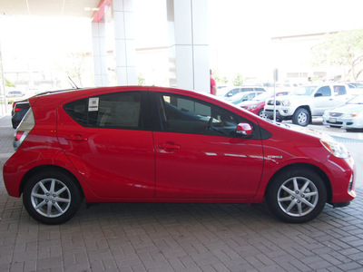 toyota prius c 2013 red hatchback three hybrid 4 cylinders front wheel drive automatic 78232