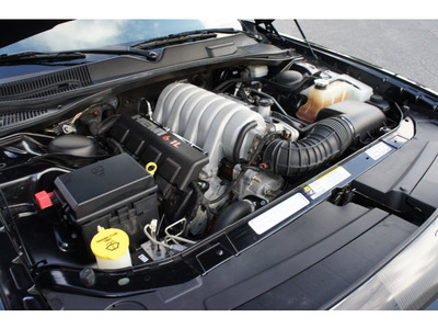 dodge challenger 2009 brilliant black coupe srt8 gasoline 8 cylinders rear wheel drive 6 speed manual 07724