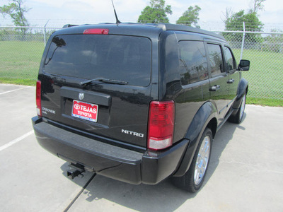 dodge nitro 2011 black suv heat gasoline 6 cylinders 2 wheel drive automatic 77587