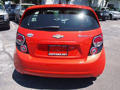 chevrolet sonic 2013 orange hatchback lt auto gasoline 4 cylinders front wheel drive automatic 75075