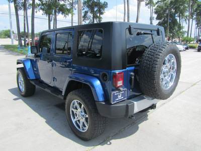 jeep wrangler unlimited 2010 blue suv sahara 6 cylinders automatic 77339