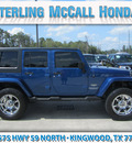 jeep wrangler unlimited 2010 blue suv sahara 6 cylinders automatic 77339