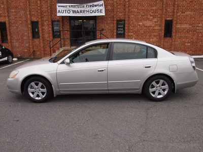 nissan altima 2002 silver sedan 2 5 s gasoline 4 cylinders front wheel drive automatic 28217