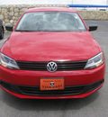 volkswagen jetta 2013 red sedan gasoline 4 cylinders front wheel drive standard 79936