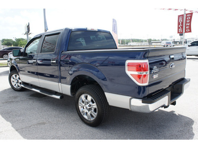 ford f 150 2009 blue xlt gasoline 8 cylinders 2 wheel drive automatic 77539