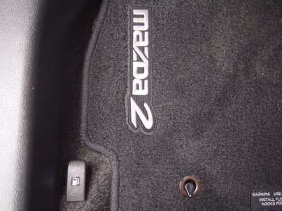 mazda mazda2 2012 black hatchback sport gasoline 4 cylinders front wheel drive manual 77099