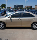 toyota camry 2011 beige sedan le gasoline 4 cylinders front wheel drive automatic 76053