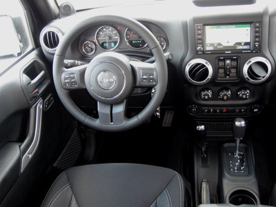 jeep wrangler unlimited 2014 black suv sahara gasoline 6 cylinders 4 wheel drive automatic 62034