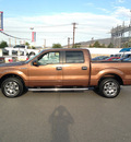 ford f 150 2011 brown flex fuel 8 cylinders 2 wheel drive automatic 79925