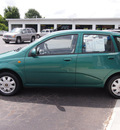 chevrolet aveo 2004 green hatchback ls gasoline 4 cylinders front wheel drive automatic 27330